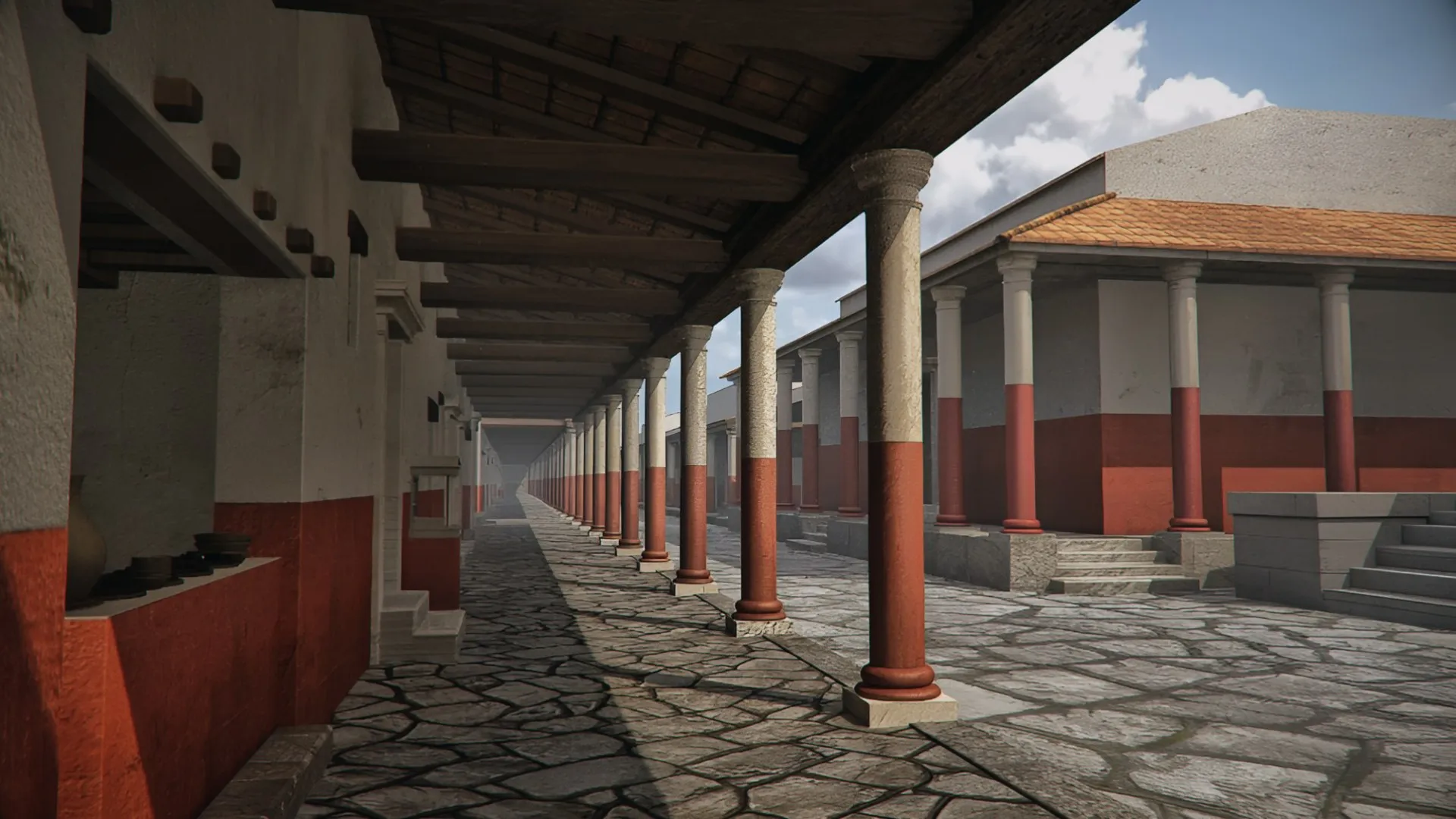 Pórtico de columnas rojas de Baelo Claudia recreado en 3D